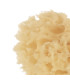Detalle de la textura de la esponja natural Jané, suave para la piel del bebé