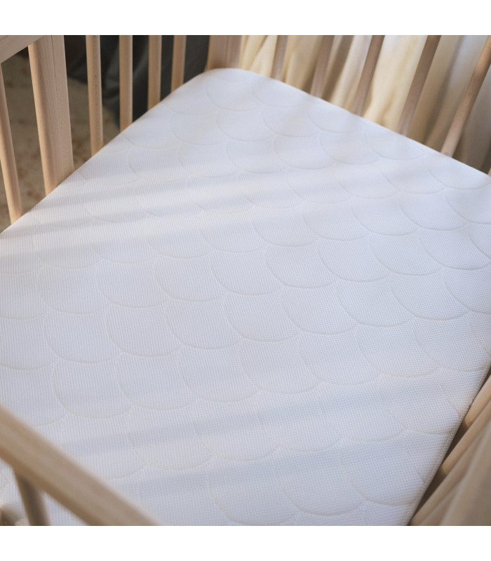 Detalle del tejido acolchado del colchón Stokke Nighti