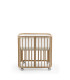 Protector de malla transpirable colocado en la minicuna Stokke Nighti Mini