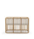 Protector de malla transpirable colocado en la cuna Stokke Nighti de 60 x 120