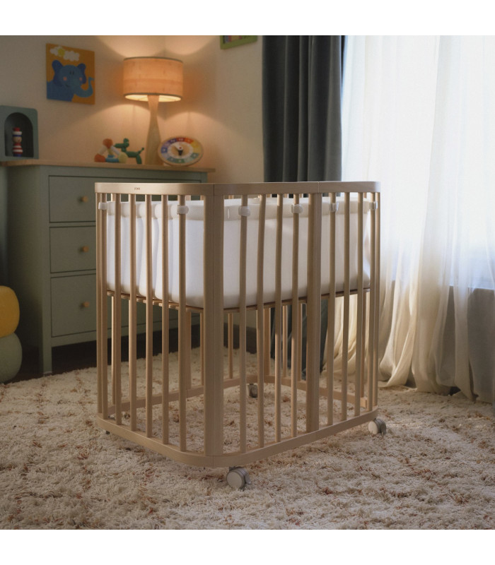 Protector de malla Stokke Nighti en la Mini: es el mismo tejido que el de la cuna