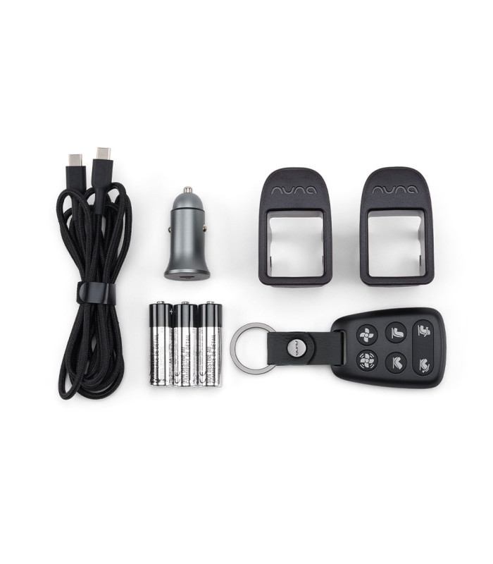 Contenido de la caja de la Nuna RELX Wind: mando, adaptador de mechero, cable USB-C, pilas y guías ISOFIX