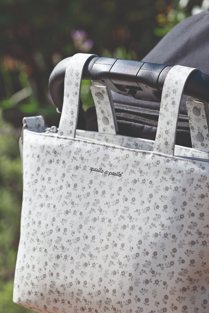 Detalle textil colección Little Bloom Pasito a Pasito floral y vichy gris